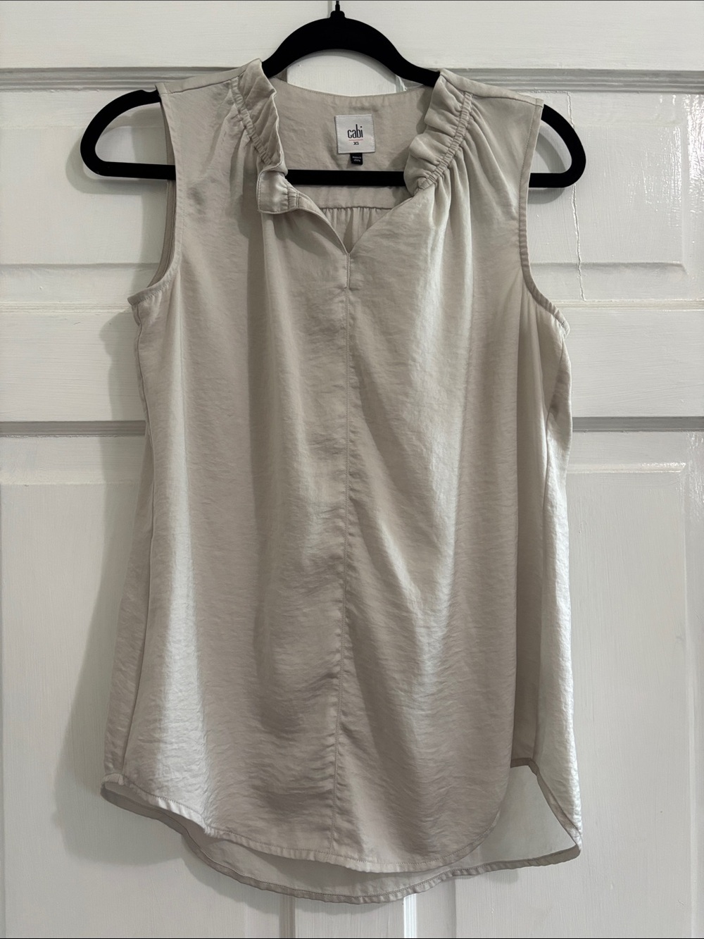 CAbi Sleeveless Ruffle-Neck Shell in Light Beige
